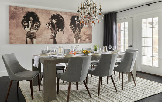 Elegant dining room with a stylish dining room rug under a modern table setting.