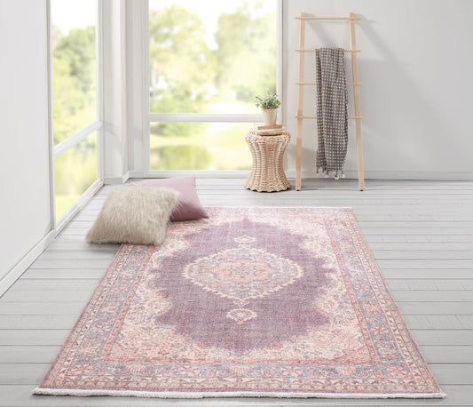 Modern kitchen with a stylish rug enhancing the decor and comfort.