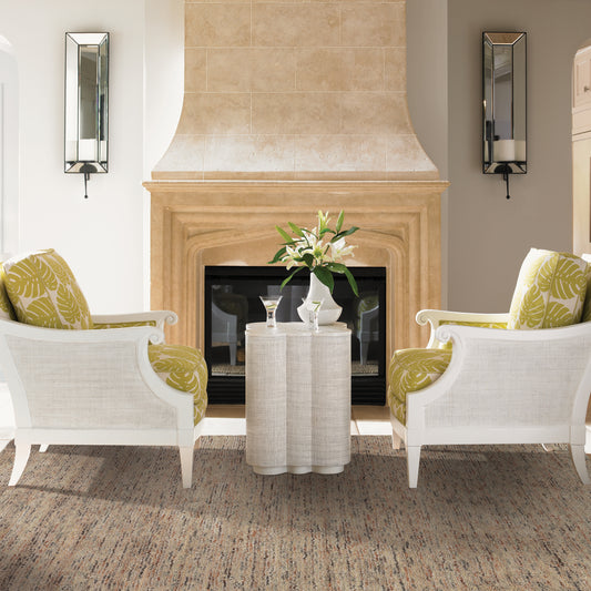 A cozy living room with a plush wool rug, complementing the warm and inviting decor