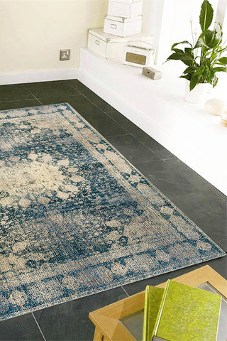 70% Polypropylene, 30% Polyester Vintage 30% Indoor Area Rug